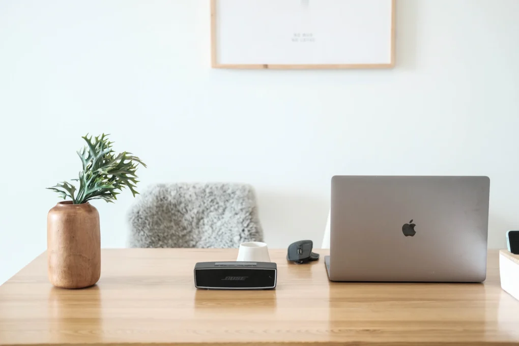 Minimal desk with a laptop set up with productivity tools